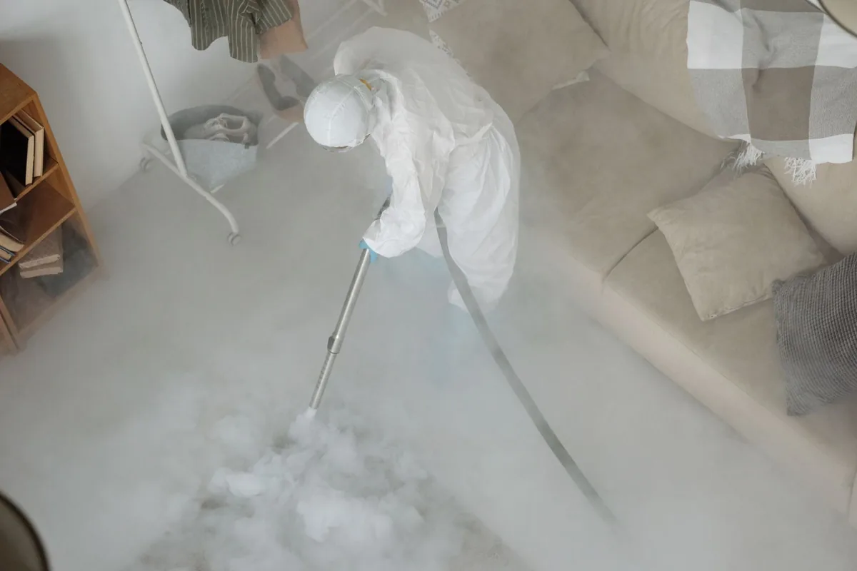 Biohazard cleanup technician in protective equipment, Soap Lake, WA